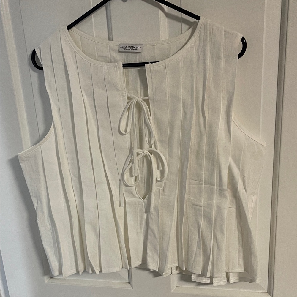 Cream Sleeveless Blouse with Front Tie
